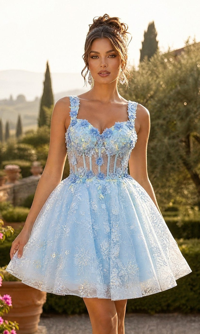 A woman stands outdoors in a garden setting, wearing the Chicas C352 short homecoming dress in Bahama Blue, featuring a fit-and-flare silhouette with 3D floral appliques and a sheer bodice.